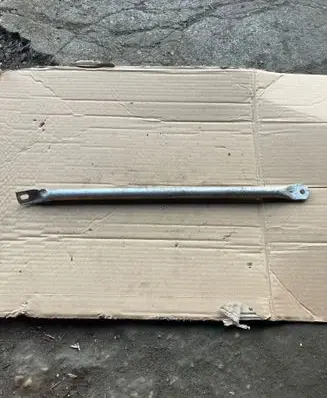 Radiator support slam panel bracket