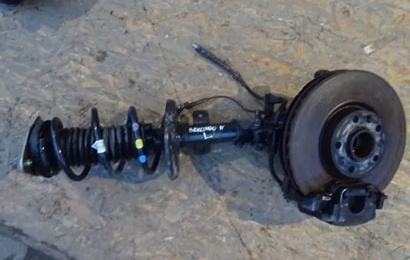 Citroen Berlingo Front shock absorber with coil spring