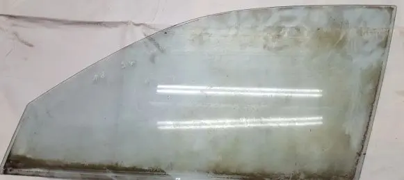 Mazda 121 Front door window glass four-door