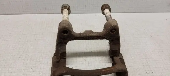 Volkswagen PASSAT B6 Brake caliper pad carrier rear 