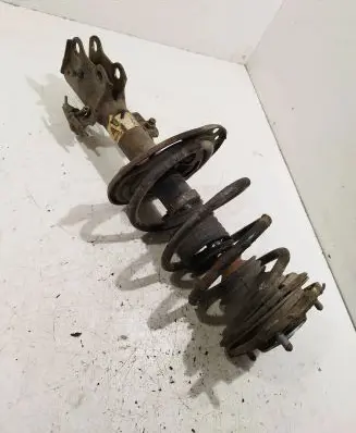 Toyota Avensis T270 Front shock absorber with coil spring f38l7