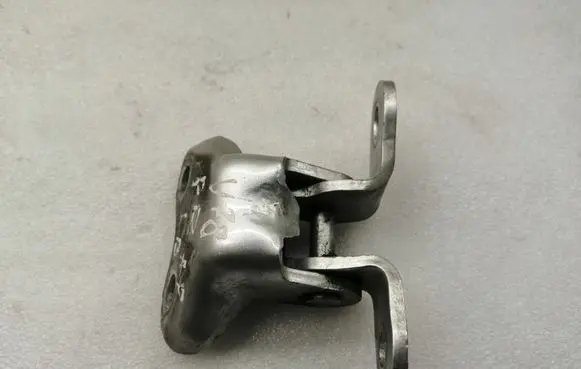 Front door lower hinge