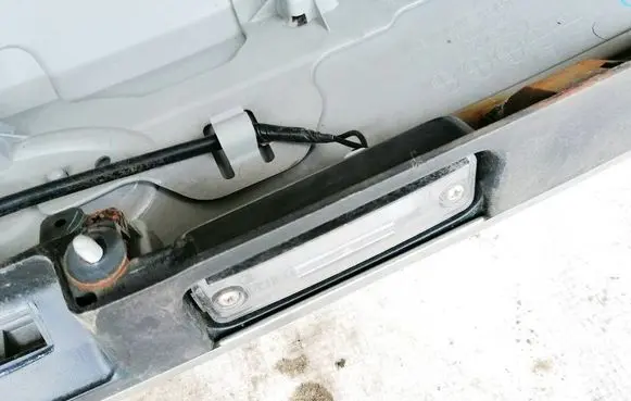 Subaru Outback Number plate light 12407
