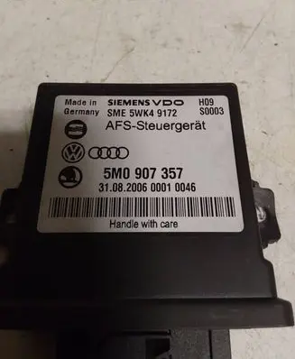 Volkswagen Touran I Light module LCM 5M0907357 5WK49172 08200600010046