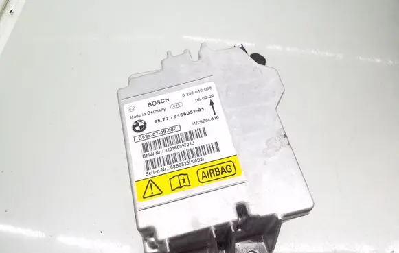 BMW 1 E81 E87 Airbag control unit/module 9166057 0285010066