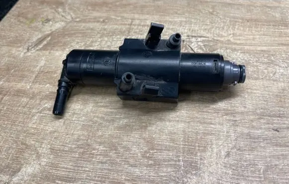 Ford Kuga II Headlight washer spray nozzle GV4113L015AE