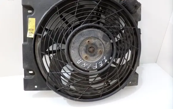 Opel Zafira A Radiator cooling fan shroud 0130303275 24431829