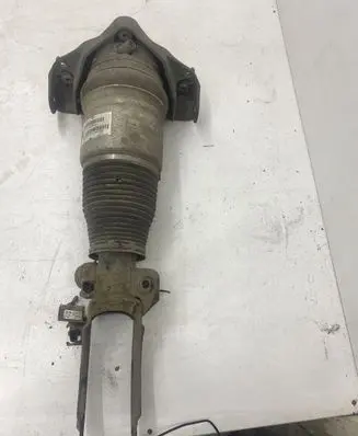 Volkswagen Touareg I Front shock absorber/damper 7L6412022T