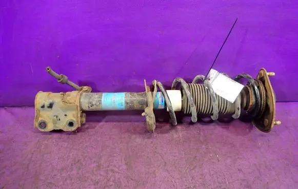 Mitsubishi Colt Front shock absorber with coil spring
