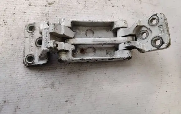 Rear door upper hinge