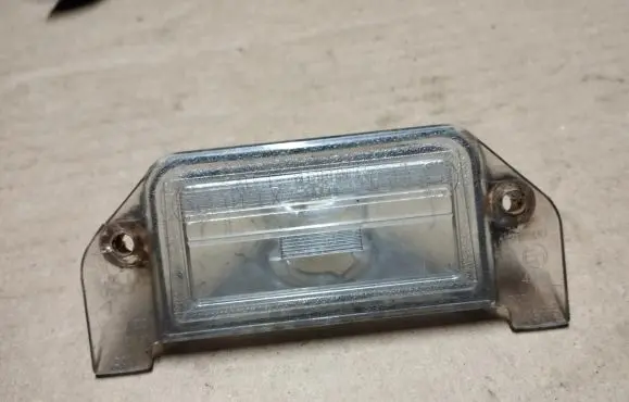Chrysler Sebring (JS) Number plate light E114314