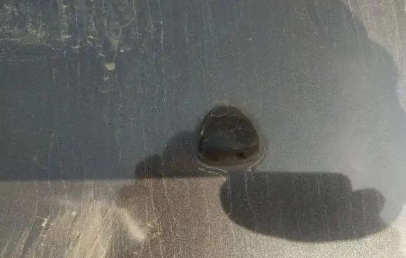 Windshield washer spray nozzle