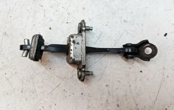 Subaru Legacy Front door check strap stopper