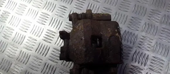Mazda 323 F Front brake caliper