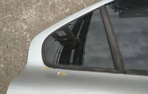 Volvo S60 Rear vent window glass 