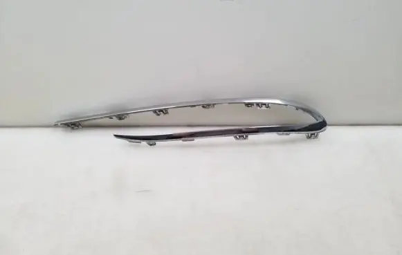 Rear bumper trim bar molding