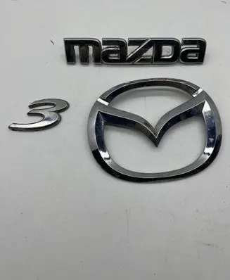 Mazda 3 I Manufacturer badge logo/emblem 51739