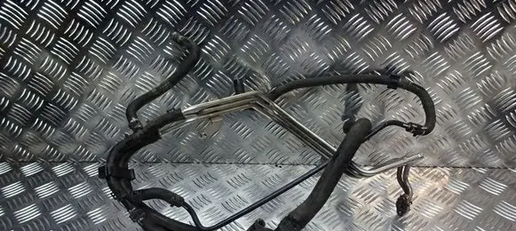 Volkswagen Jetta VI Heater radiator pipe/hose 04E122157H