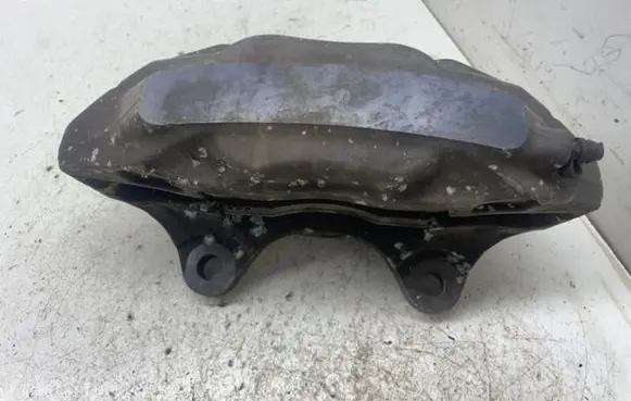 Volkswagen Touareg I Front brake caliper 209236052A