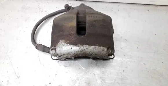 Volkswagen Jetta VI Front brake caliper 582