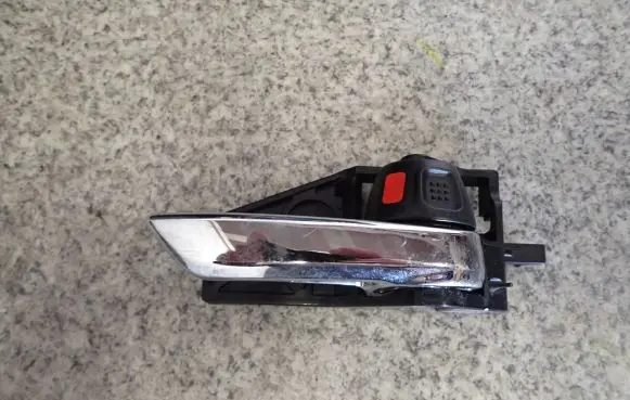Suzuki Swift II Front door interior handle 