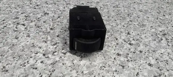 Mitsubishi Carisma Headlight level height control switch