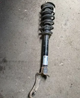 Dodge Durango Front shock absorber with coil spring 1A14973A