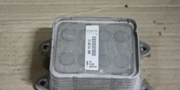 Volkswagen Golf VII Engine oil radiator 04E117021C