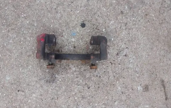 Volkswagen Touran I Front Brake Caliper Pad/Carrier 