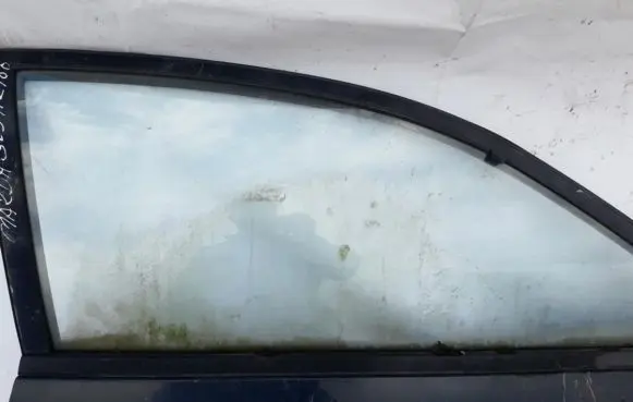 Mazda 323 Front door window glass four-door