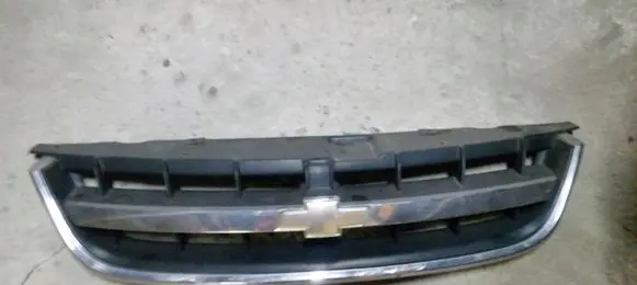 Chevrolet Lacetti Front bumper upper radiator grill 96399717