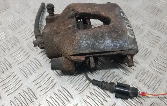 Volkswagen Golf VI Front brake caliper