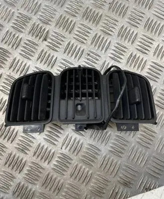 Dash center air vent grill