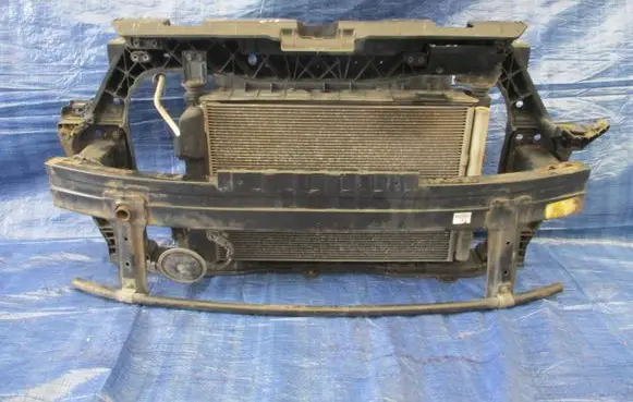 Radiator support slam panel
