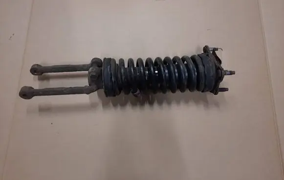 Jeep Cherokee III KJ Front shock absorber with coil spring