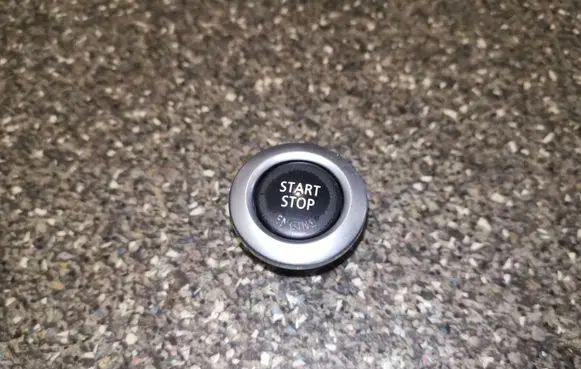 Engine start stop button switch