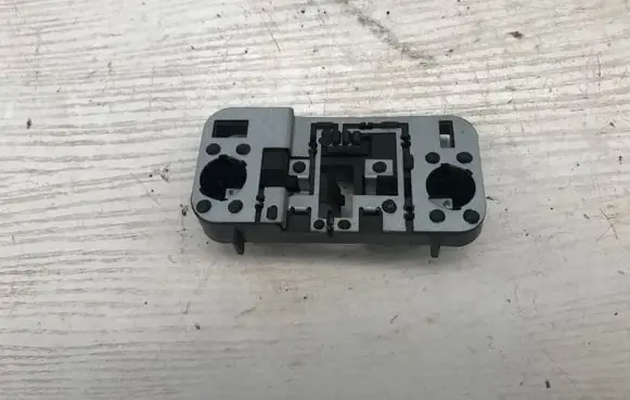 Saab 9-3 Ver2 Tail light bulb cover holder