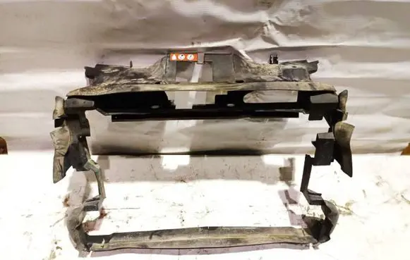 Radiator support slam panel