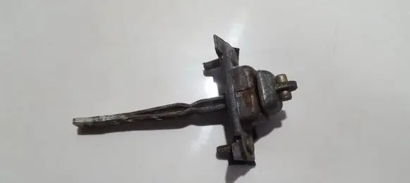 Mazda 323 F Rear door check strap stopper