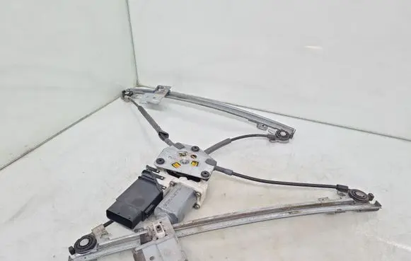 Volkswagen Golf IV Front door window regulator with motor 101387101