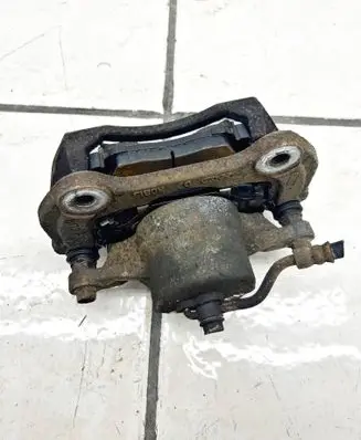 Hyundai Tucson TL Front brake caliper 