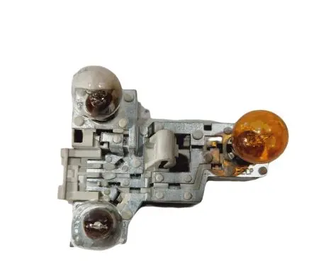 Tail light bulb cover holder