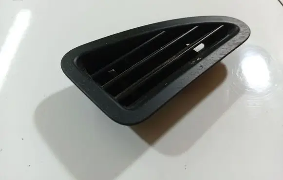 Dash center air vent grill
