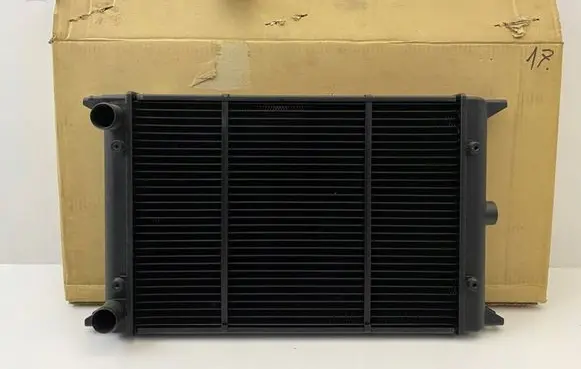 Volkswagen Polo II 86C 2F Coolant radiator 727114