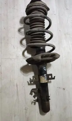 Front shock absorber with coil spring