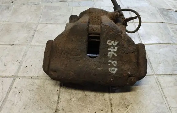 Volkswagen PASSAT B5 Front brake caliper