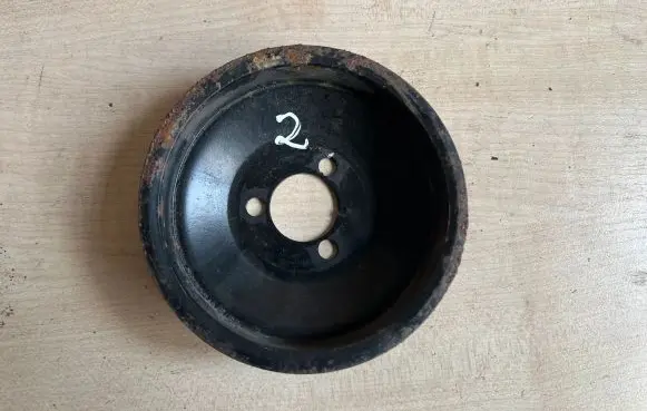Opel Astra H Water pump pulley 24405900