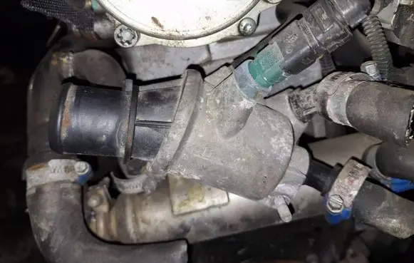 Opel Zafira B Engine coolant pipe/hose 106168e8