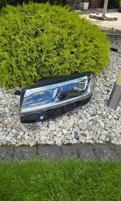 Volkswagen Touareg III Headlight/headlamp 761941035B