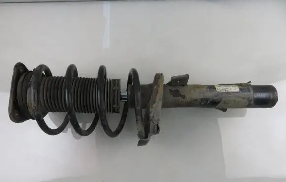 Ford Focus Front shock absorber with coil spring 4M5118K001ABE